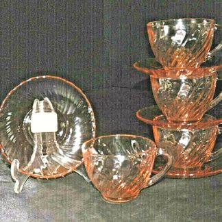 Arcoroc pink glass tea cups and saucers, France.